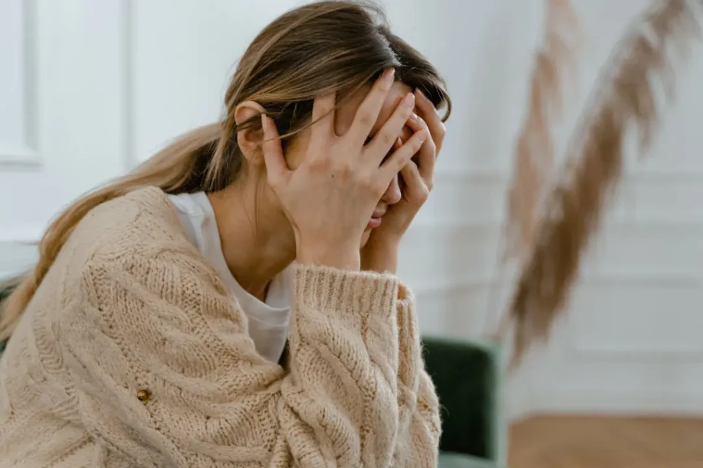 stress woman sitting on a sofa