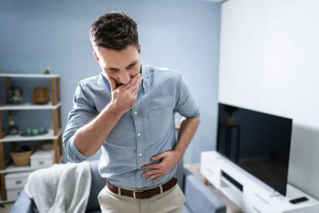 A man having pain in his belly. 