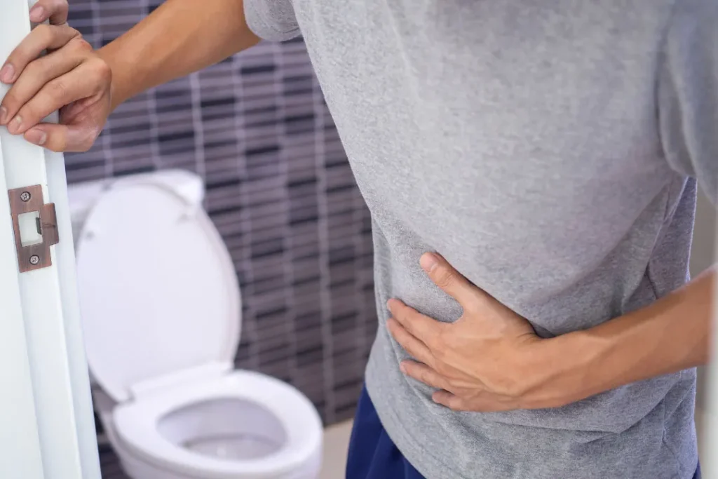 man suffering from diarrhea