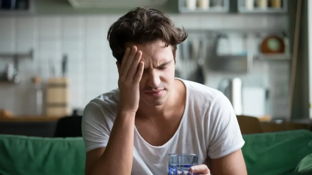 Man facing headache. 