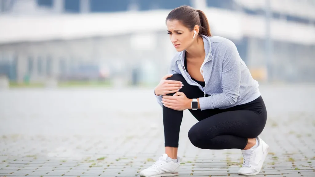 Lady facing muscle cramps. 