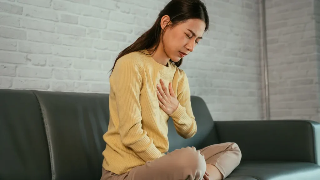 Lady having chest pain. 